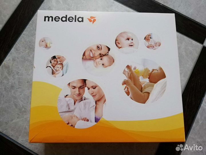 Молокоотсос medela mini электрический