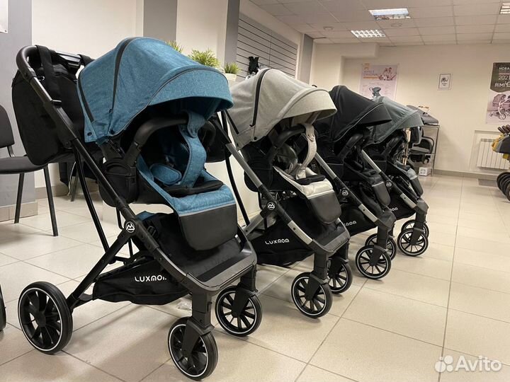 Прогулочная коляска с реверсивным блоком