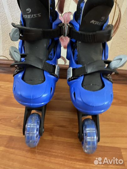 Роликовые коньки