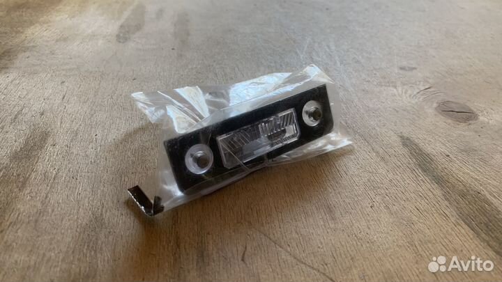 Фонарь освещения номерного знака skoda