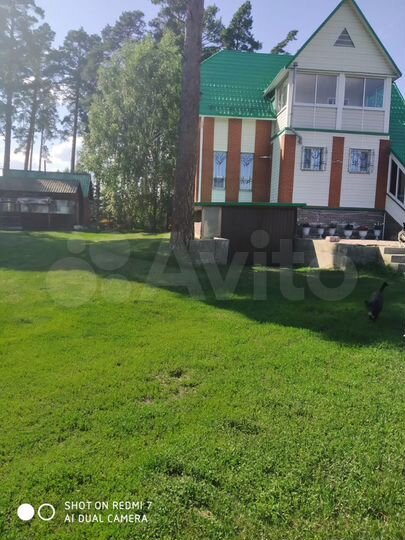 Коттедж 208 м² на участке 24 сот.