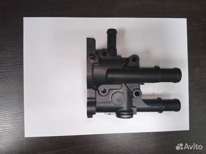 Корпус термостата Opel Astra H Chevrolet Cruze