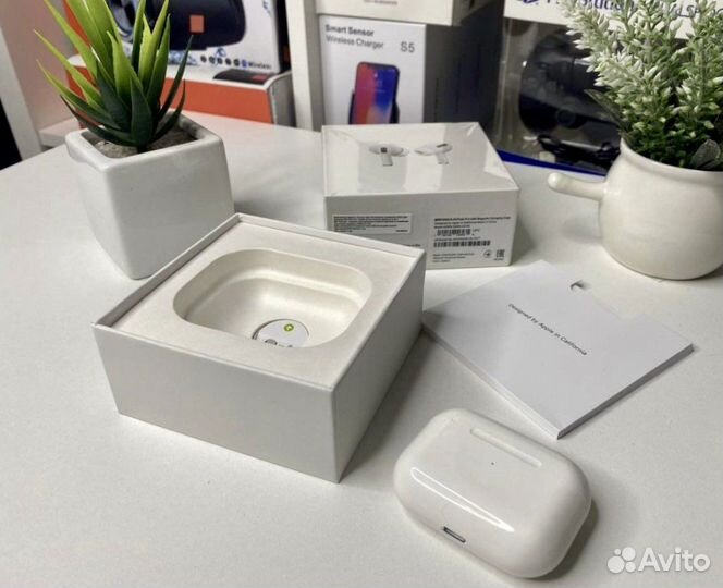 Беспроводные наушники Apple