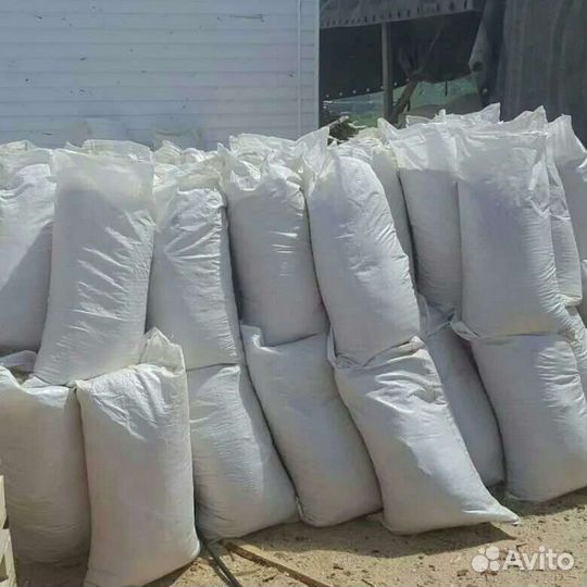 Опилки в мешках