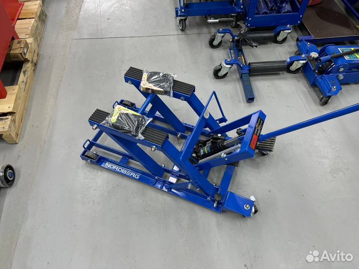 Подкатной мотодомкрат