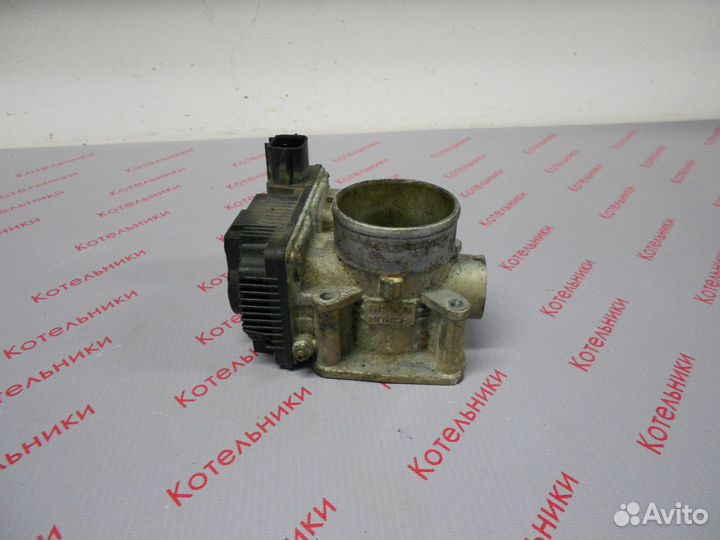 Nissan 16119-AU000 Заслонка дроссельная