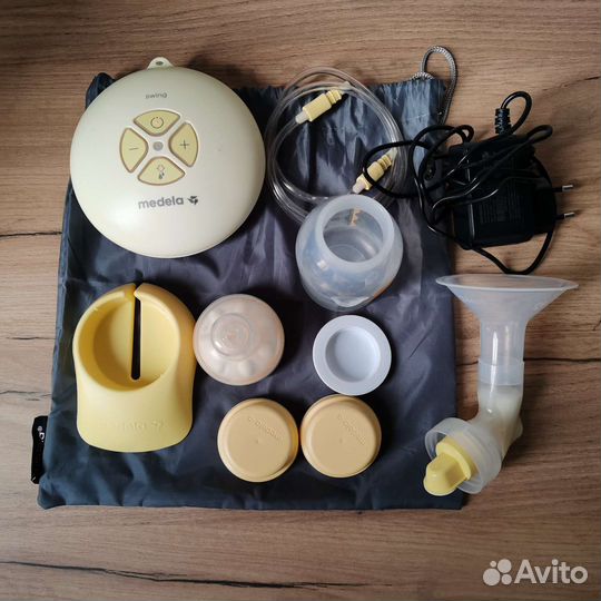 Молокоотсос medela электрический