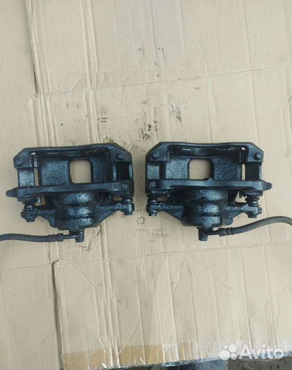 Суппорт тормозной передний Хонда CR-V3 RE