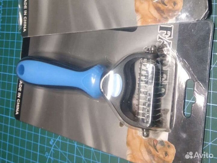 Когтерезка, колтунорез и игрушка для животных