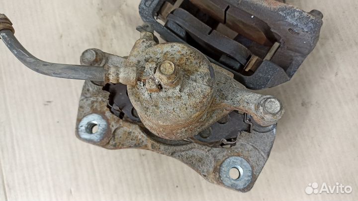 Суппорт тормозной левый правый Шевроле Лачетти
