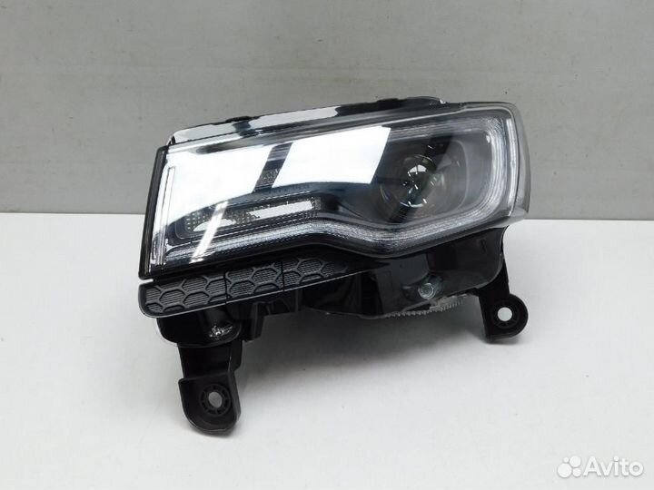 Фара левая Jeep Grand Cherokee