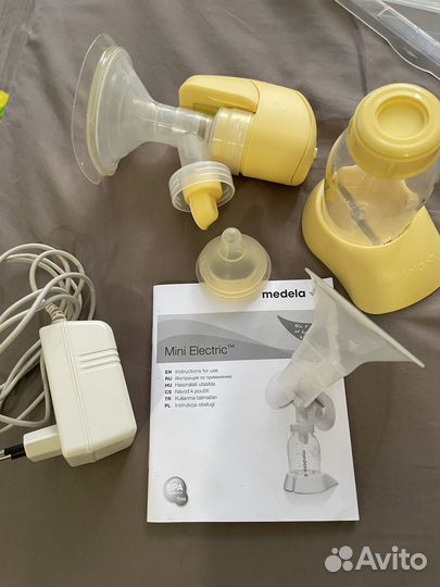 Молокоотсос medela электрический