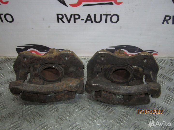 Суппорт передний Nissan Primera P11E 1996-2002