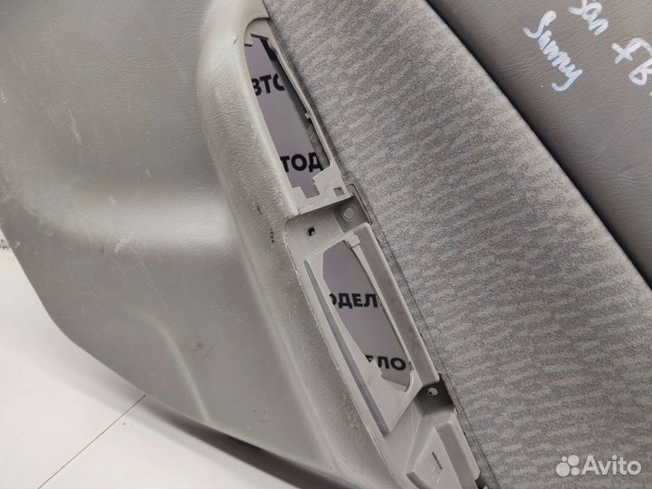 Обшивка двери задняя правая Nissan Sunny FB15