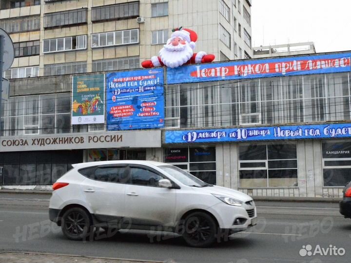 Надувная голова Деда Мороза на крышу