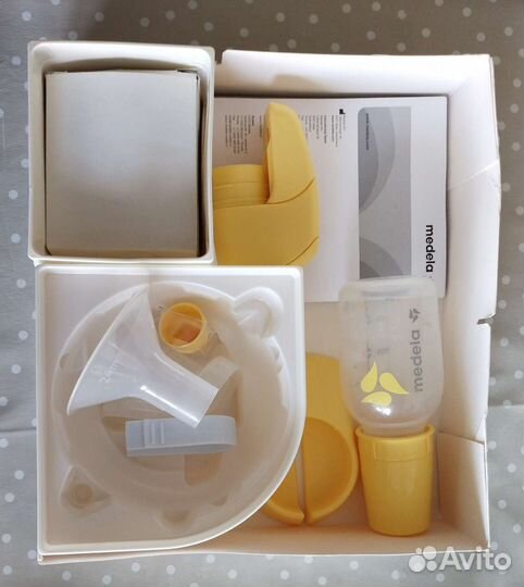 Молокоотсос medela электрический