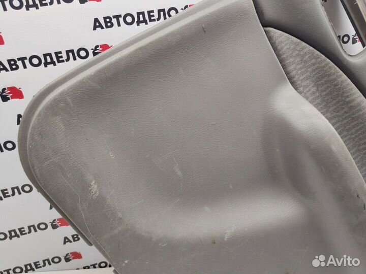 Обшивка двери задняя правая Nissan Sunny FB15