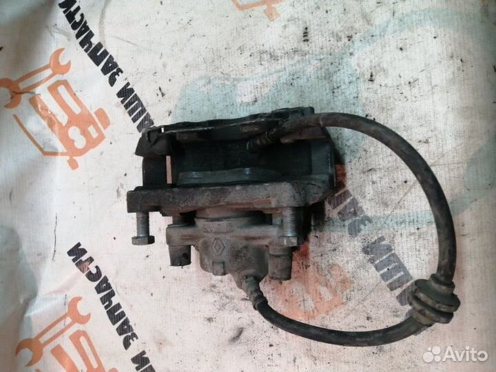 Суппорт тормозной передний левый Renault Fluence