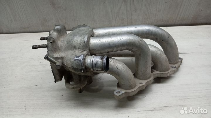 Коллектор впускной Mazda 323 BA