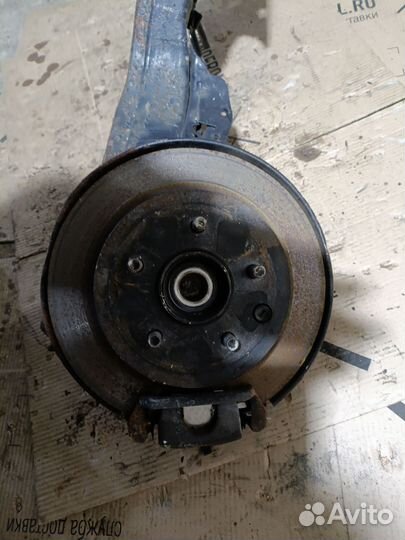 Кулак поворотный Nissan Dualis NJ10 задний левый