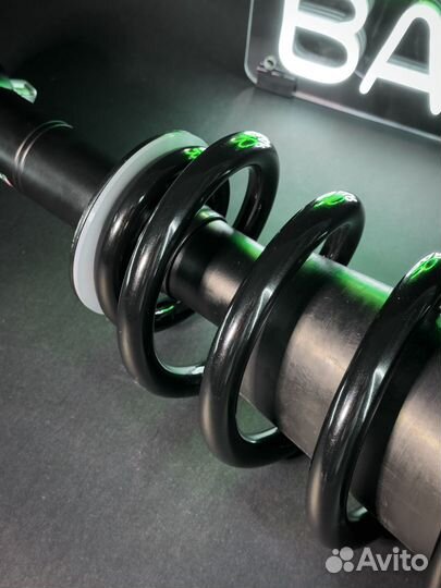 Передний амортизатор с пружиной Cadillac Escalade