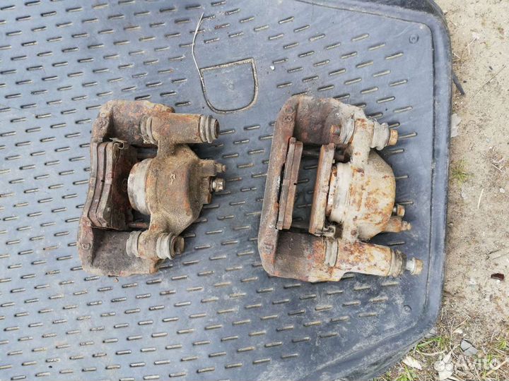 Тормозной суппорт Мазда Демио 1