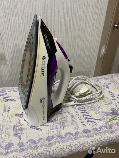 Гладильная доска с утюгом