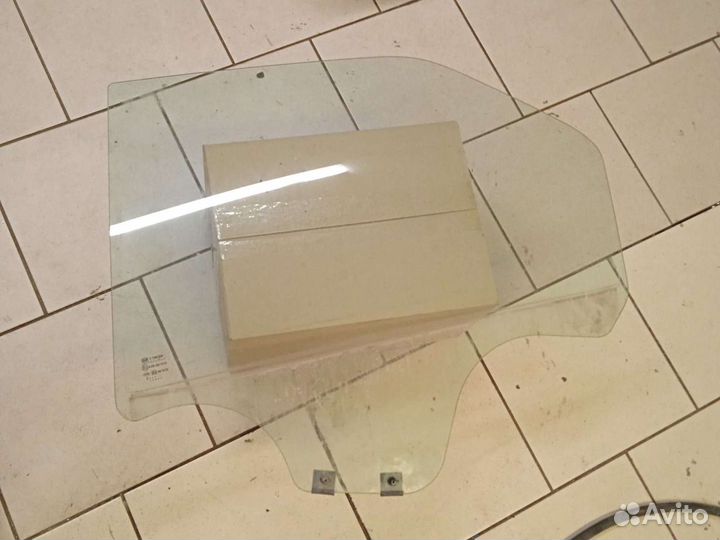 Стекло левое рено логан