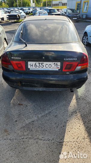 Мицубиши каризма