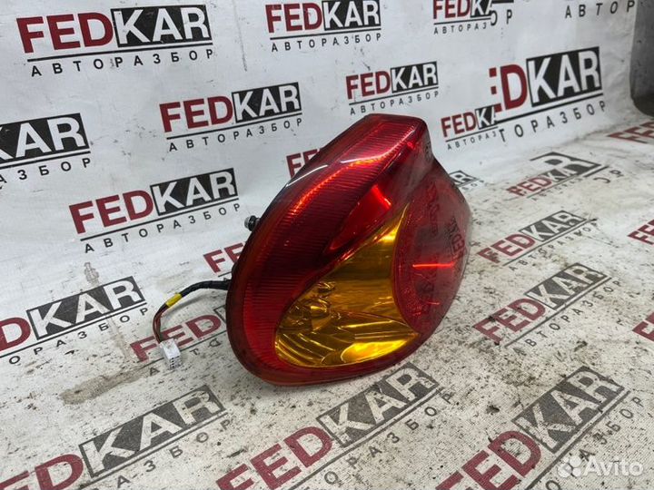 Фонарь задний левый задний левый Kia Spectra SD