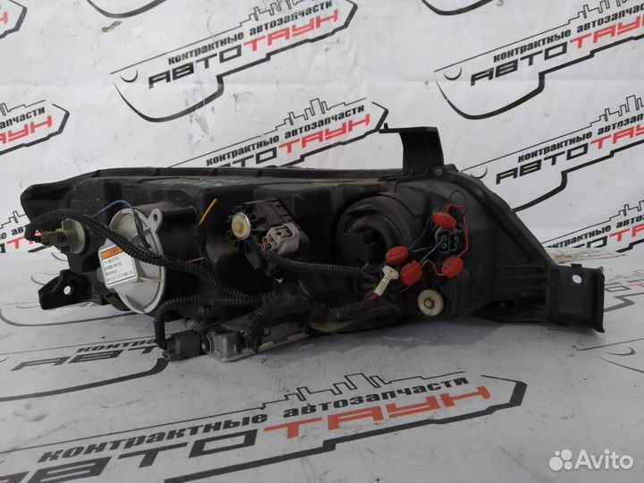Фара honda odyssey RB1 RB2 10022497 xenon левая пр