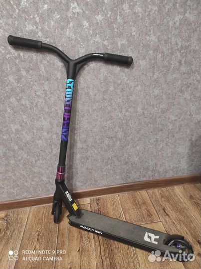 Трюковой самокат Reaction