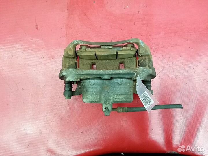 Суппорт тормозной nissan serena MR20DD