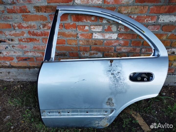Левая дверь задняя на Ниссан Альмера Классик