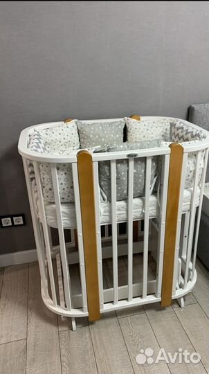 Детская кроватка с поперечным маятником