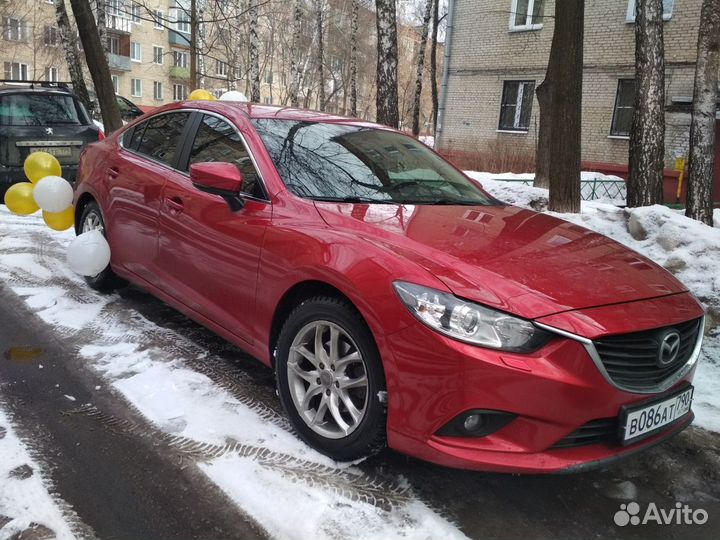 Диск литой, оригинальный Мазда