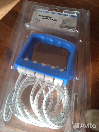 Эспандер для груди Torneo в упаковке