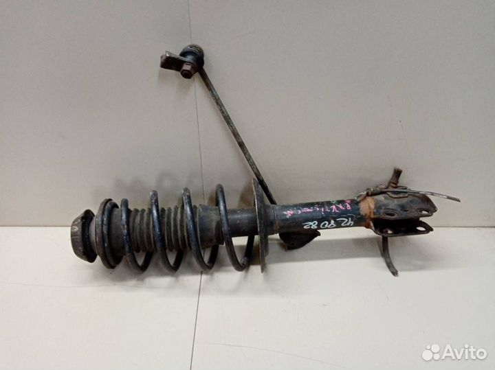 Амортизатор передний левый Toyota Ractis NCP100 20