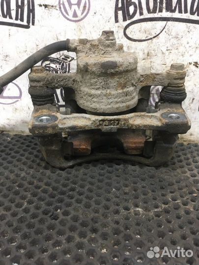 Суппорт передний левый Chevrolet Aveo T 250 F14D3