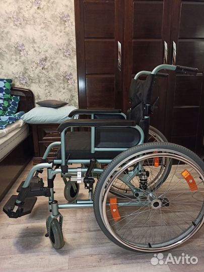 Инвалидная коляска