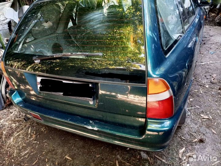 Митсубиси Либеро крыло. Итд