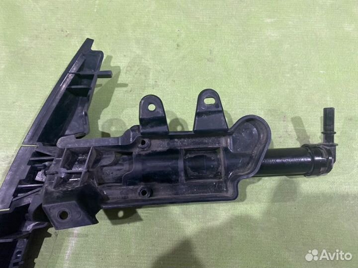 Форсунка омывателя фары левая Jeep Grand Cherokee