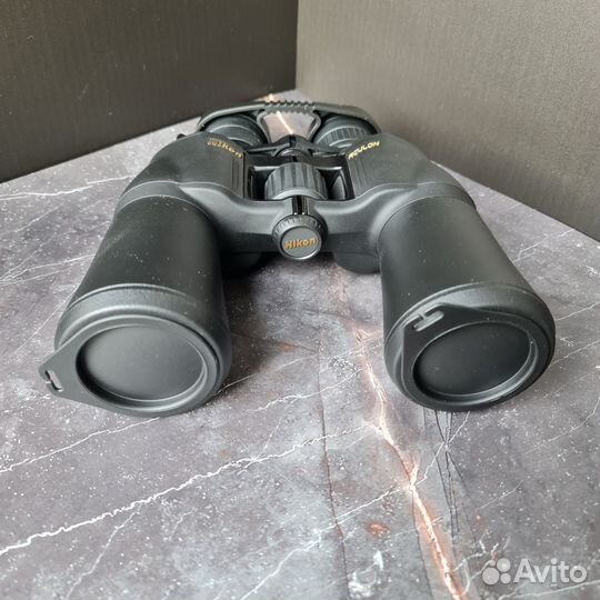 Новый бинокль Nikon Aculon A211 10-22x50