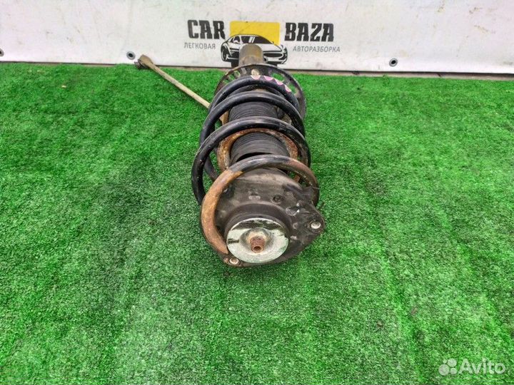 Амортизатор передний левый