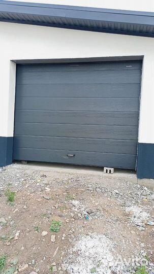 Гаражные секционные ворота под ключ