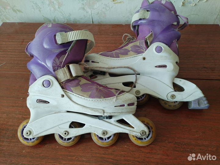 Роликовые коньки