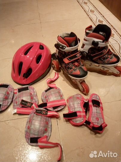 Роликовые коньки