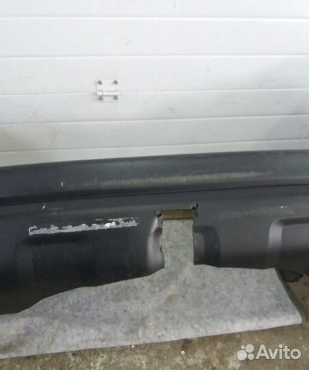 Бампер задний Mitsubishi Pajero Sport 2