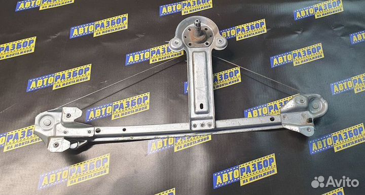 Стеклоподъемник механ. задний левый Opel Astra