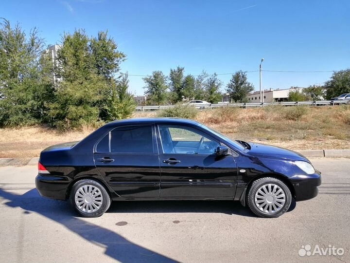 Mitsubishi Lancer 1.6 МТ, 2009, 215 000 км